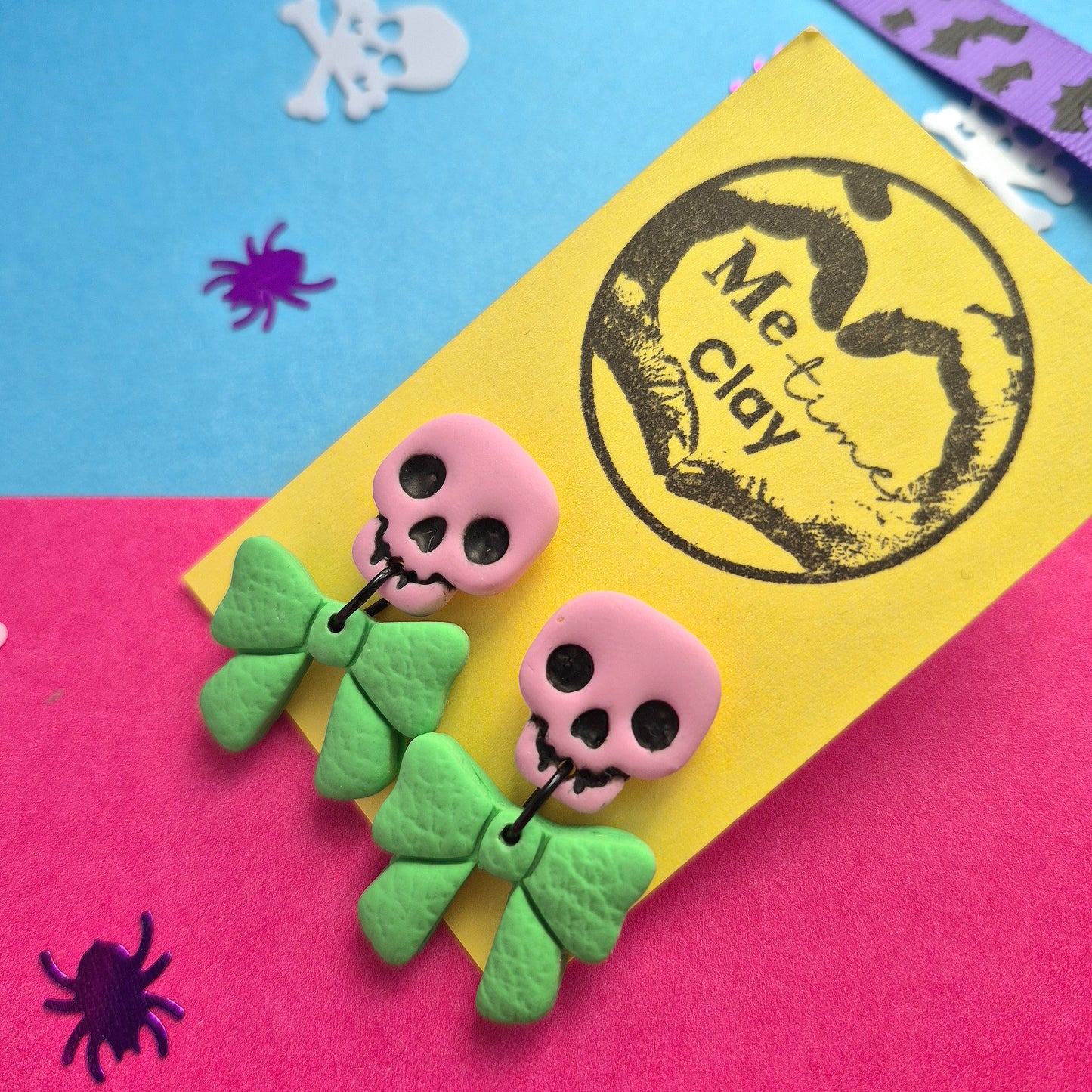 Cute halloween dangle earrings, skull + bow, light pink + green