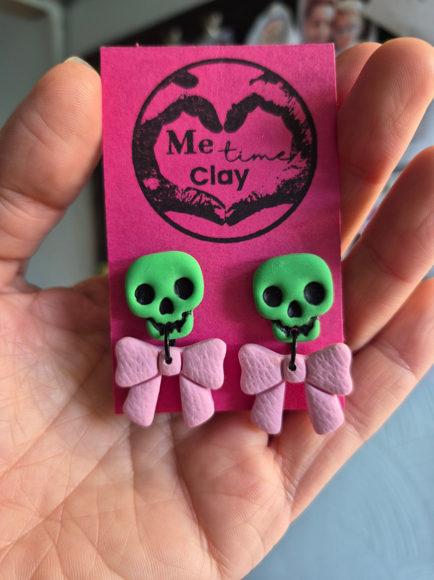 Cute halloween dangle earrings, skull + bow, green + light pink