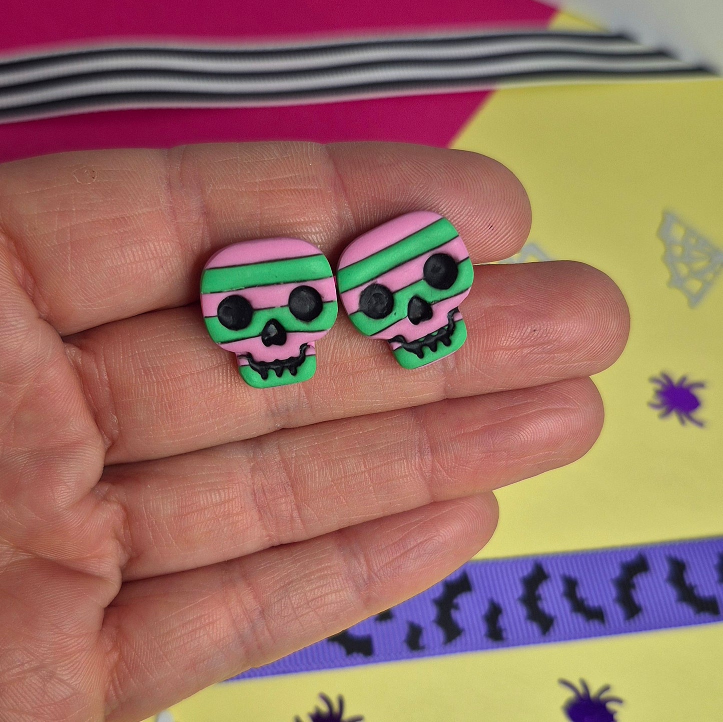 Cute halloween stripy stud earrings, skull green+ pink
