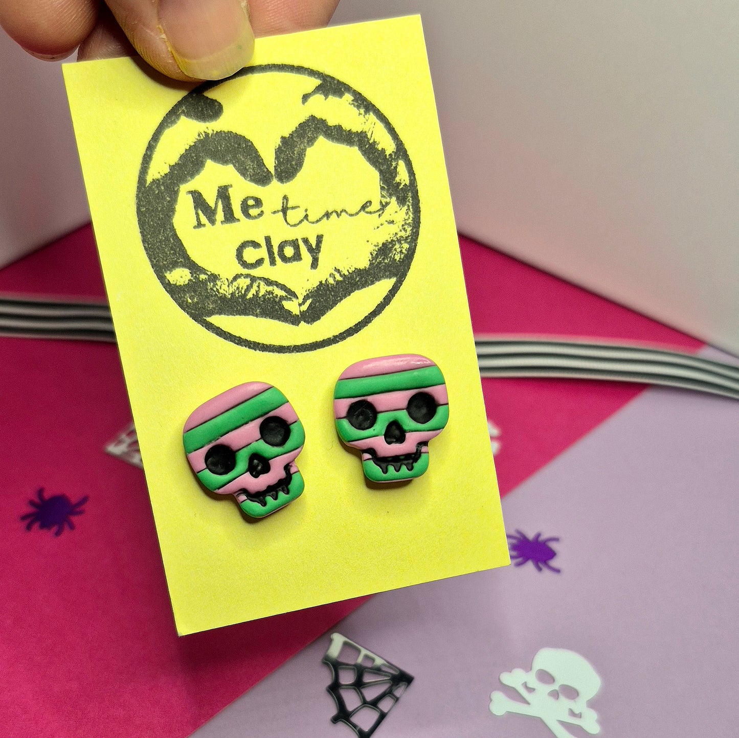Cute halloween stripy stud earrings, skull green+ pink