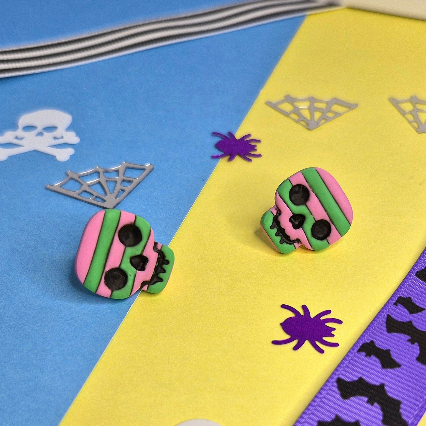 Cute halloween stripy stud earrings, skull green+ pink