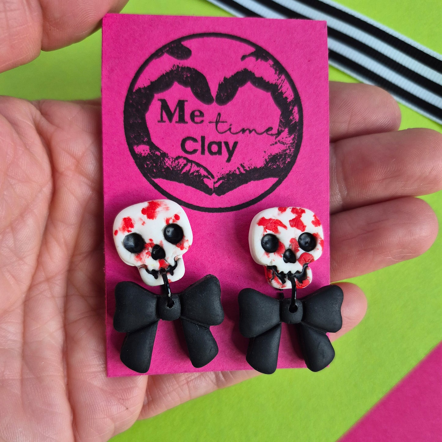 Cute halloween dangle earrings, skull + bow, white-bloody + black