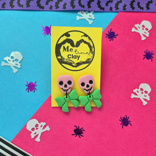 Cute halloween dangle earrings, skull + bow, light pink + green