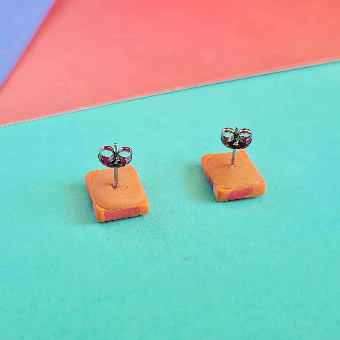 Orange knitted style polymer clay stud earrings, rectangle