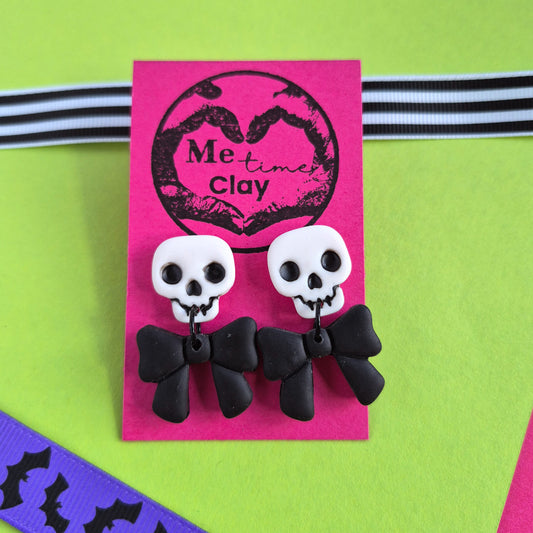 Cute halloween dangle earrings, skull + bow, white + black (made to order)